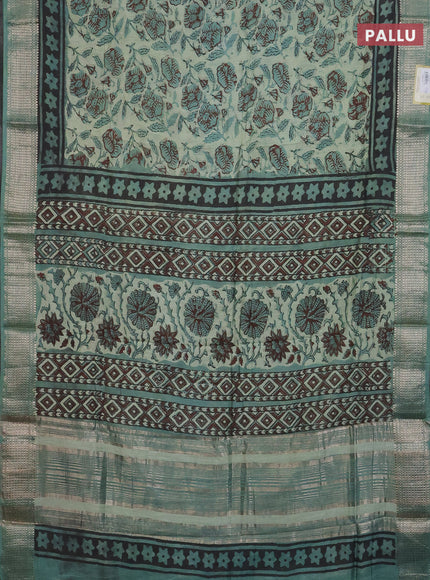 Semi chanderi saree pastel green and teal green shade with allover kalamkari prints and zari woven border