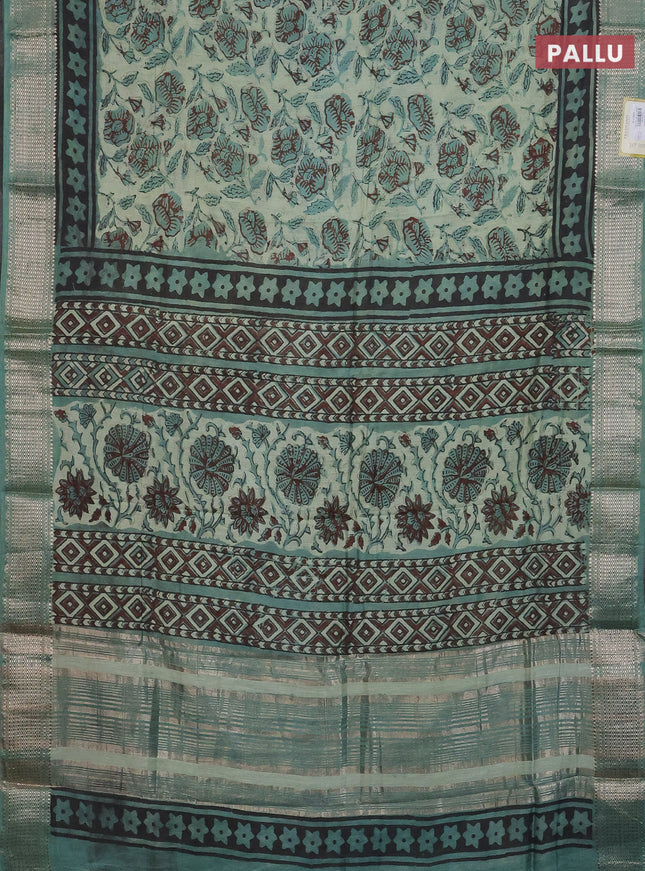 Semi chanderi saree pastel green and teal green shade with allover kalamkari prints and zari woven border