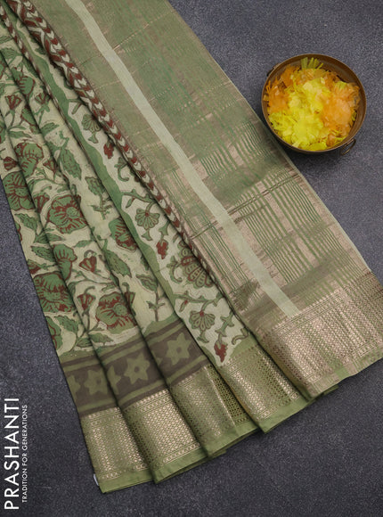 Semi chanderi saree pista green and green with allover kalamkari prints and zari woven border