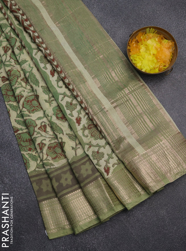 Semi chanderi saree pista green and green with allover kalamkari prints and zari woven border