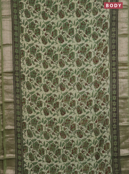 Semi chanderi saree pista green and green with allover kalamkari prints and zari woven border