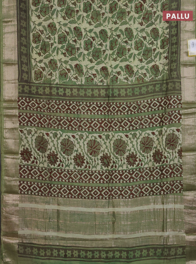 Semi chanderi saree pista green and green with allover kalamkari prints and zari woven border