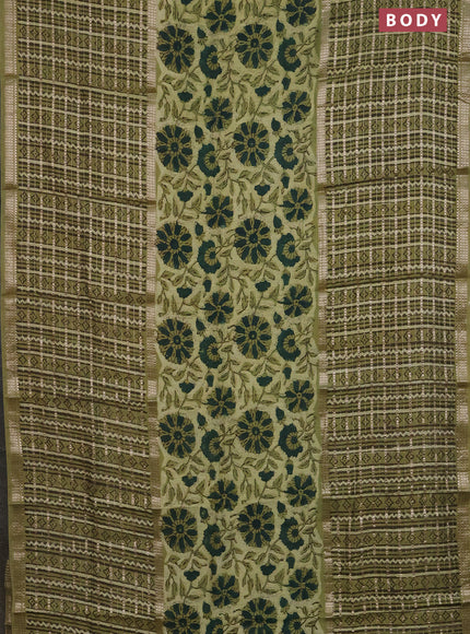 Semi chanderi saree pista green with allover kalamkari prints and long printed zari border