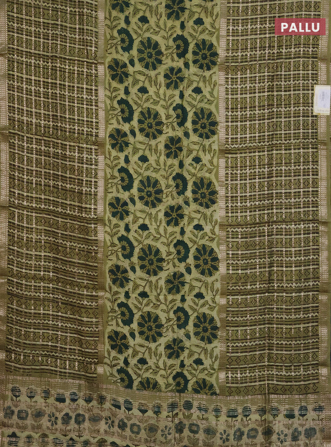 Semi chanderi saree pista green with allover kalamkari prints and long printed zari border