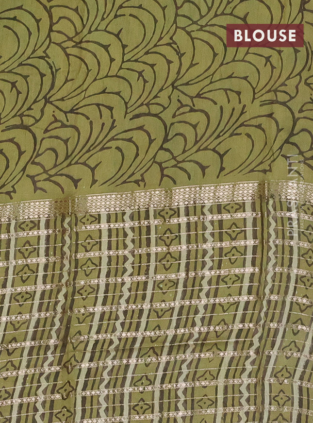 Semi chanderi saree pista green with allover kalamkari prints and long printed zari border