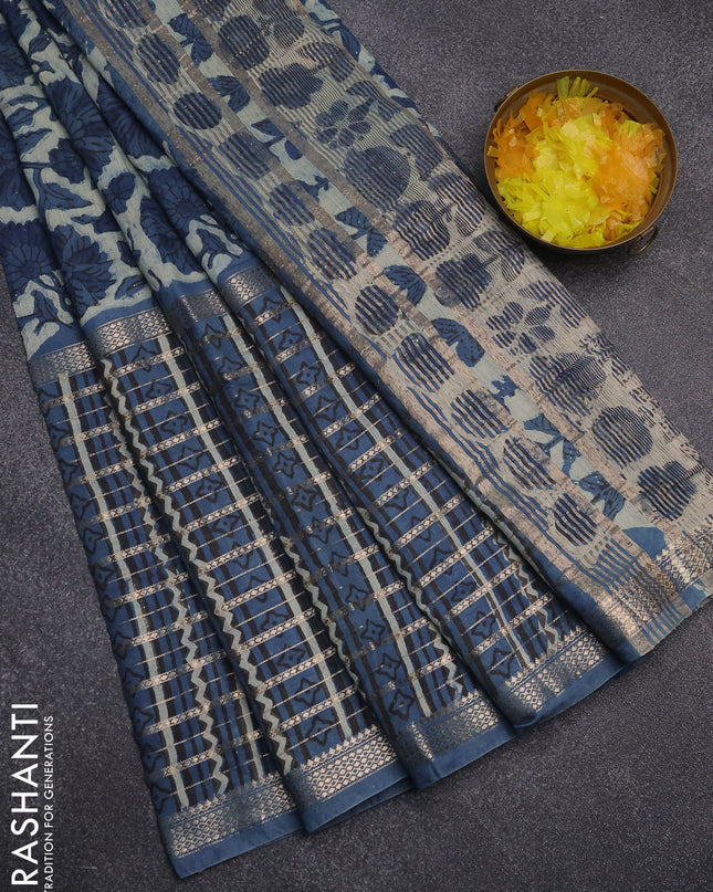 Semi chanderi saree beige and peacock blue with allover kalamkari prints and long printed zari border