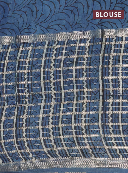 Semi chanderi saree beige and peacock blue with allover kalamkari prints and long printed zari border