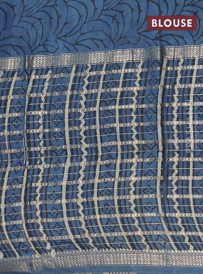 Semi chanderi saree beige and peacock blue with allover kalamkari prints and long printed zari border