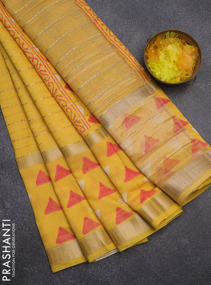 Semi chanderi saree yellow with allover zari weaves and long printed zari border