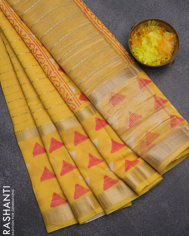 Semi chanderi saree yellow with allover zari weaves and long printed zari border