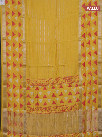 Semi chanderi saree yellow with allover zari weaves and long printed zari border