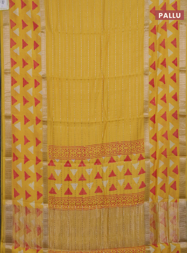 Semi chanderi saree yellow with allover zari weaves and long printed zari border