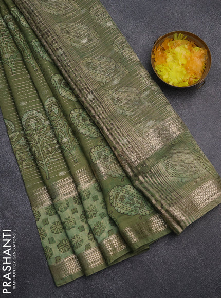 Semi chanderi saree green with allover butta prints & zari weaves and long printed zari border