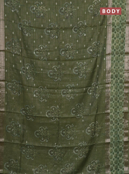 Semi chanderi saree green with allover butta prints & zari weaves and long printed zari border