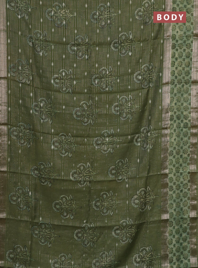 Semi chanderi saree green with allover butta prints & zari weaves and long printed zari border