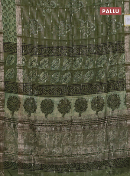Semi chanderi saree green with allover butta prints & zari weaves and long printed zari border