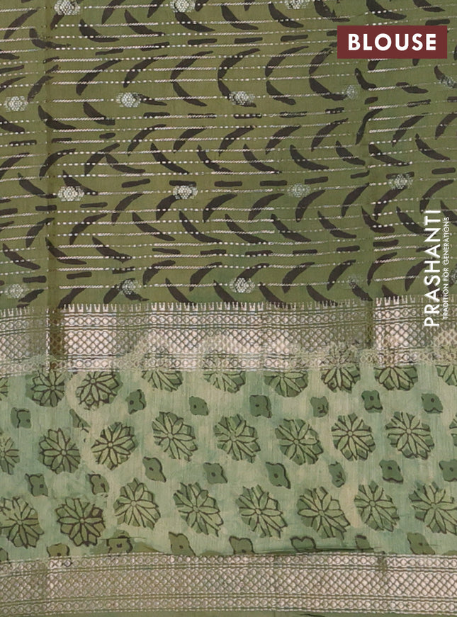 Semi chanderi saree green with allover butta prints & zari weaves and long printed zari border