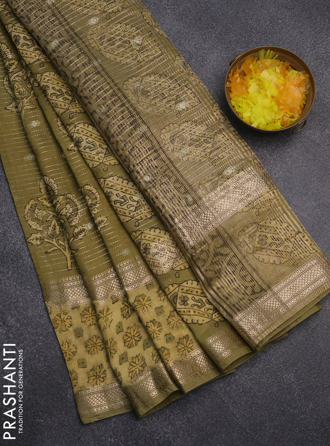 Semi chanderi saree sap green shade with allover butta prints & zari weaves and long printed zari border