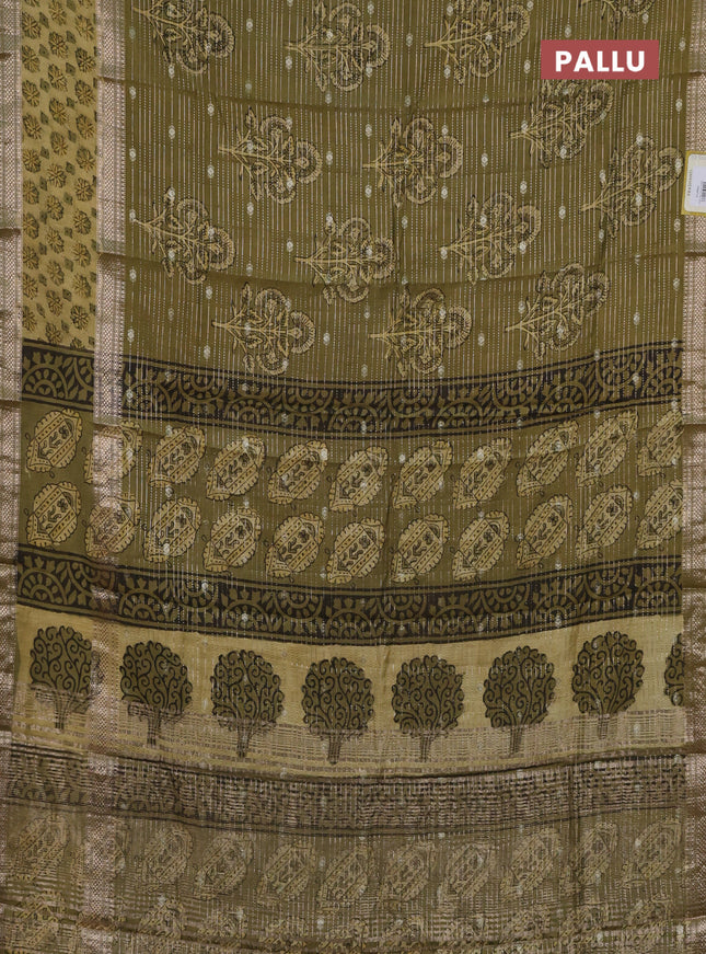 Semi chanderi saree sap green shade with allover butta prints & zari weaves and long printed zari border