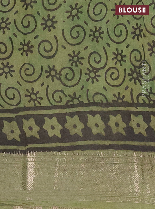 Semi chanderi saree pista green and sap green with allover ajrakh prints and zari woven border