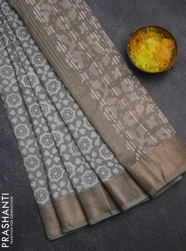 Semi chanderi saree grey shade with allover batik prints and zari woven border