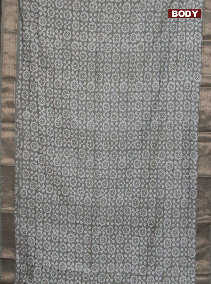 Semi chanderi saree grey shade with allover batik prints and zari woven border