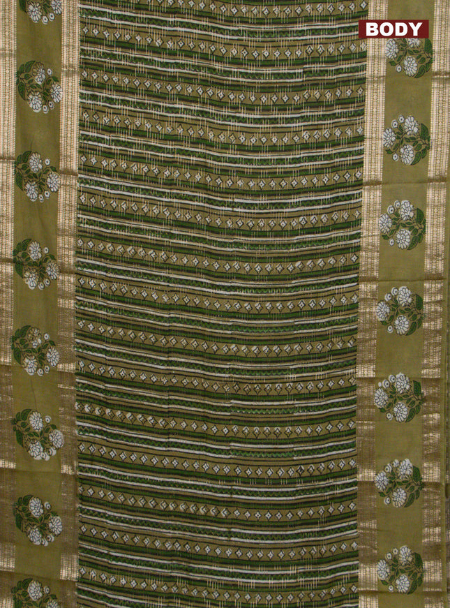 Semi chanderi saree sap green and green with allover prints & zari weaves and long floral butta printed zari border