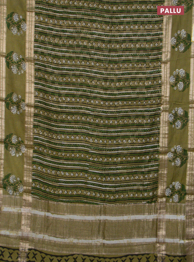 Semi chanderi saree sap green and green with allover prints & zari weaves and long floral butta printed zari border