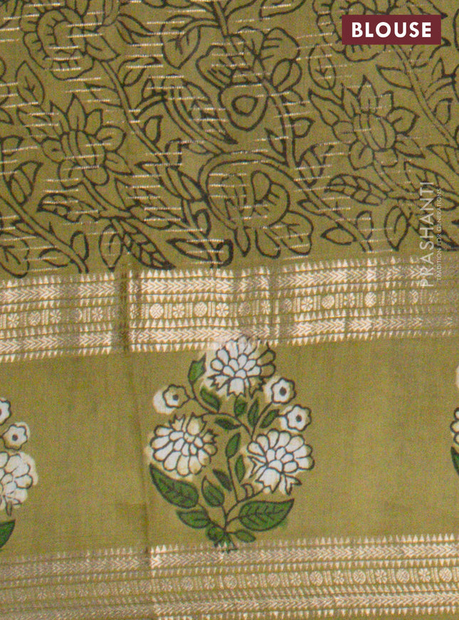 Semi chanderi saree sap green and green with allover prints & zari weaves and long floral butta printed zari border