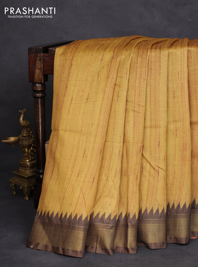 Semi tussar saree mustard shade and beige with plain body and madhubani printed pallu