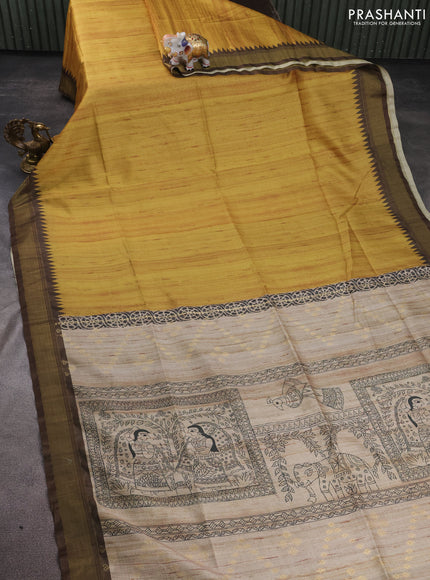 Semi tussar saree mustard shade and beige with plain body and madhubani printed pallu