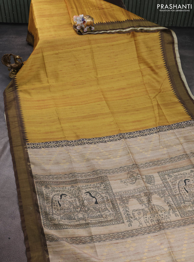 Semi tussar saree mustard shade and beige with plain body and madhubani printed pallu