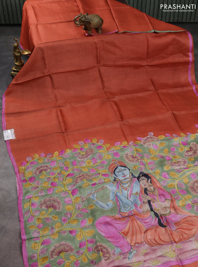 Pure tussar partly silk saree rustic orange and pastel green with plain body and kalamkari hand painted prints