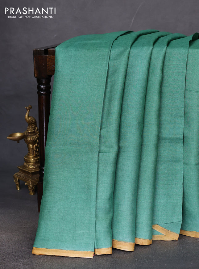 Pure tussar partly silk saree teal green and pink with plain body and kalamkari hand painted prints