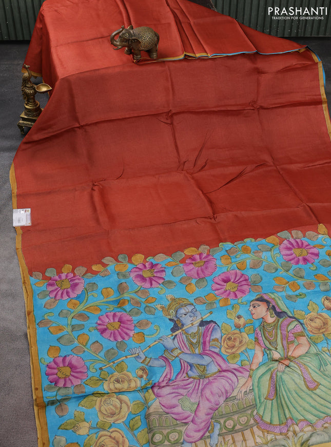 Pure tussar partly silk saree rustic orange and teal blue with plain body and kalamkari hand painted prints