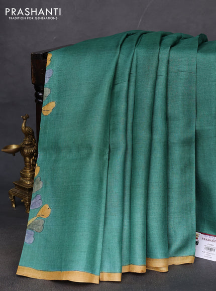 Pure tussar partly silk saree green and peach orange with plain body and kalamkari hand painted prints