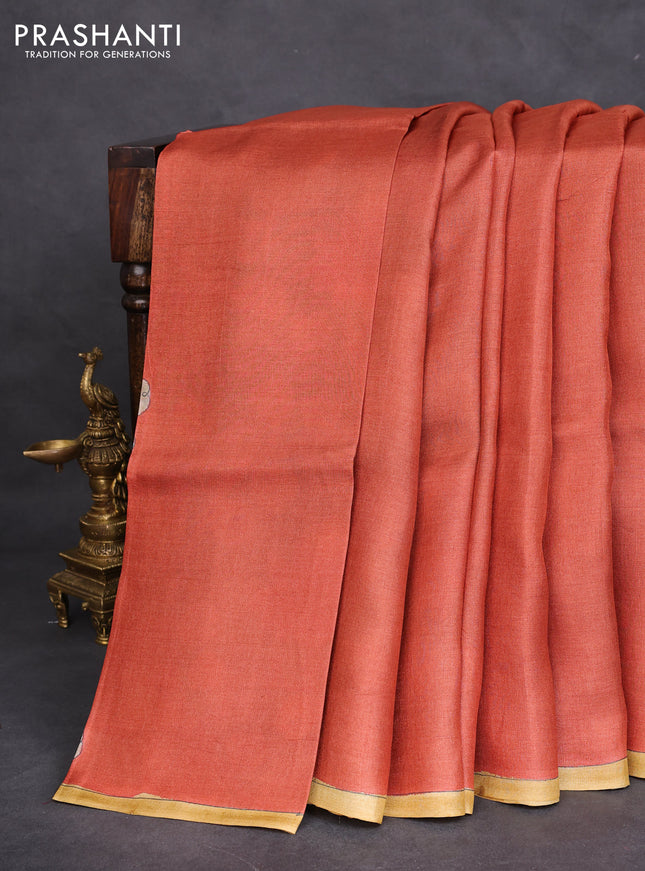 Pure tussar partly silk saree rustic orange and teal green with plain body and kalamkari hand painted prints