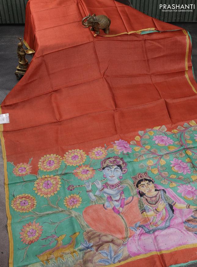 Pure tussar partly silk saree rustic orange and teal green with plain body and kalamkari hand painted prints
