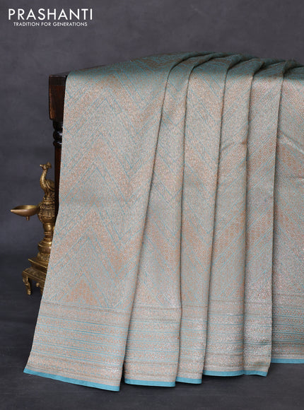 Banarasi silk cotton saree teal blue with allover brocade zari weaves and woven border