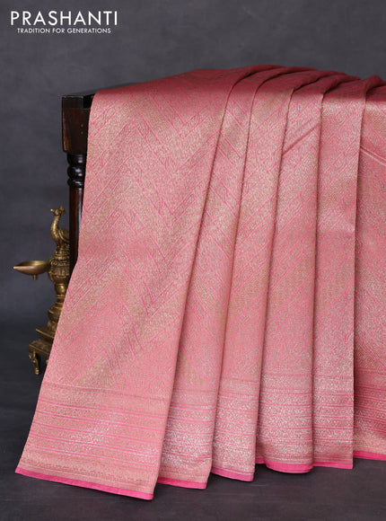 Banarasi silk cotton saree pastel pink with allover brocade zari weaves and woven border