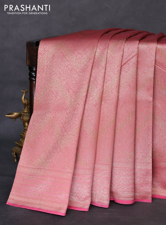 Banarasi silk cotton saree pastel pink with allover brocade zari weaves and woven border