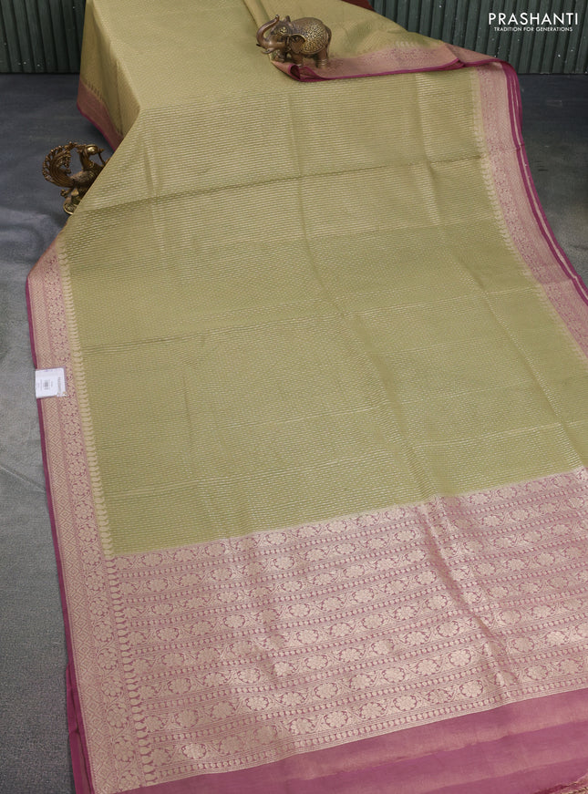 Banarasi tissue silk cotton saree mehendi green and wine shade with allover zari weaves and woven border