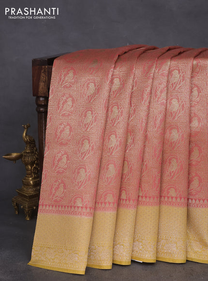 Banarasi silk cotton saree pink shade and yellow with allover thread & zari woven brocade weaves and woven border