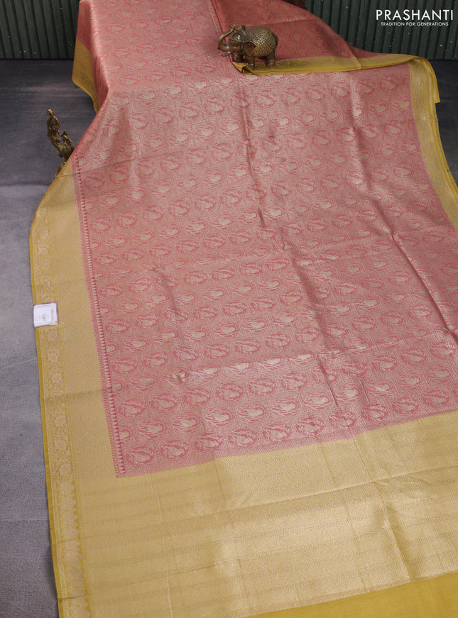 Banarasi silk cotton saree pink shade and yellow with allover thread & zari woven brocade weaves and woven border