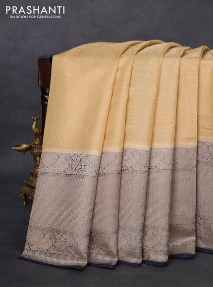 Banarasi tissue silk cotton saree sandal and navy blue with plain body and long woven border