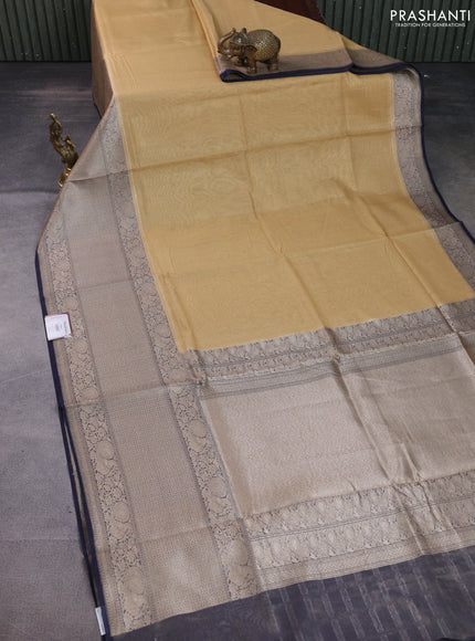 Banarasi tissue silk cotton saree sandal and navy blue with plain body and long woven border