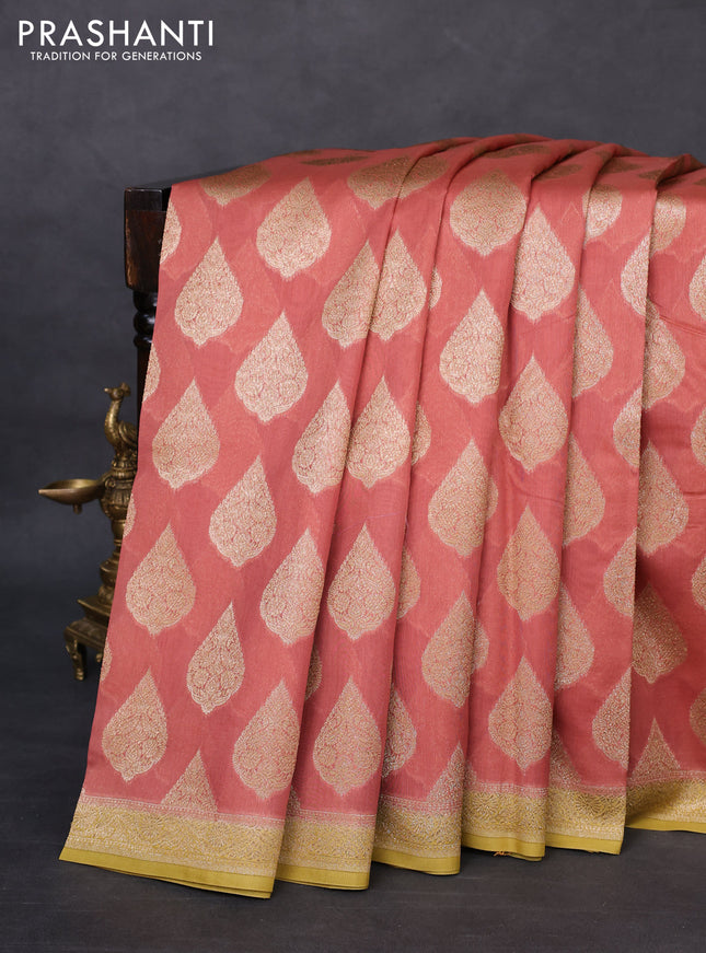 Banarasi silk cotton saree peach shade and yellow with woven buttas and woven border