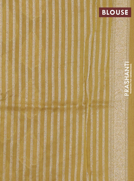 Banarasi silk cotton saree peach shade and yellow with woven buttas and woven border
