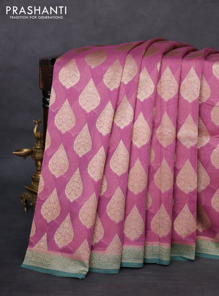 Banarasi silk cotton saree mauve pink and teal green with woven buttas and woven border