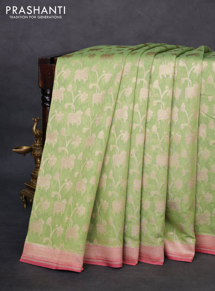 Banarasi silk cotton saree light green and pink shade with allover zari weaves and zari woven border
